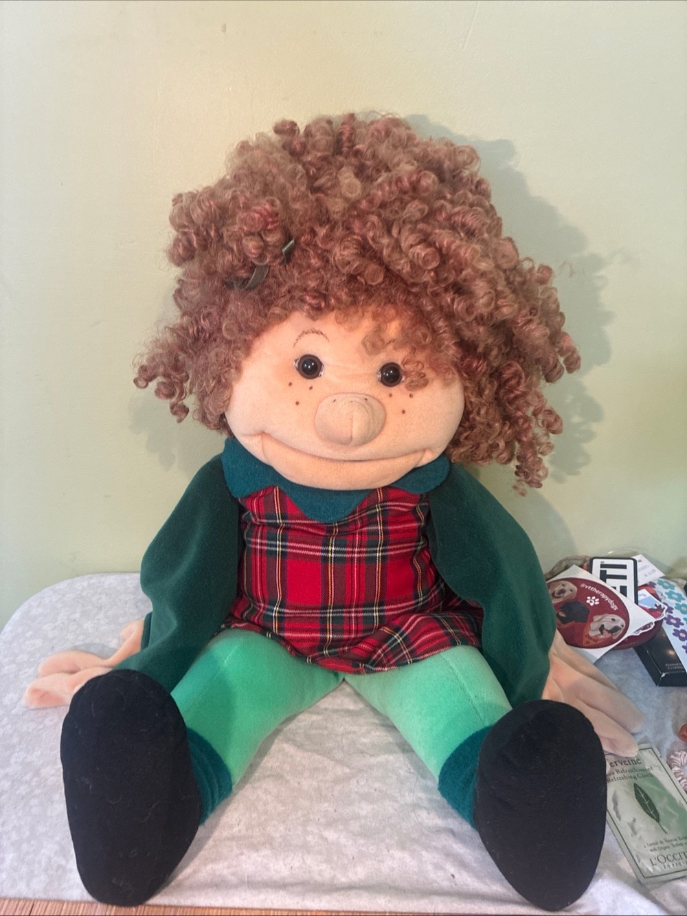 Folkmans Plush puppet hand Doll in Green Outfit with Red Plaid Dress